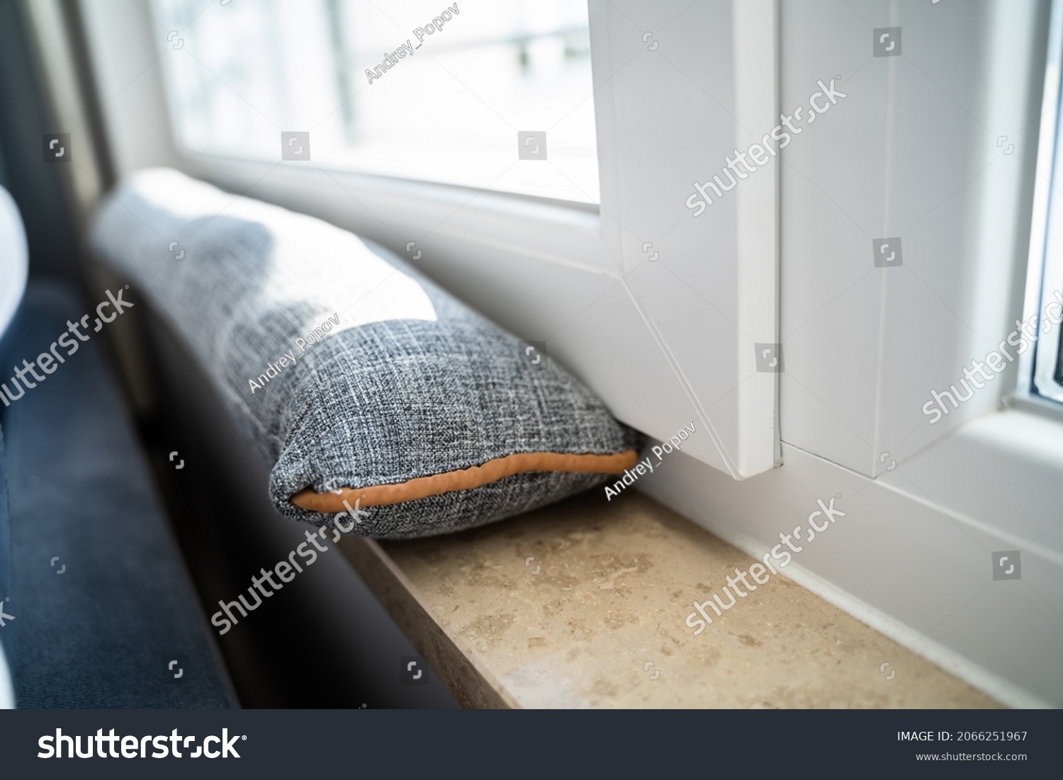 Draft Excluder Under Window Blocking Cold Air From Traveling Around #2066251967
