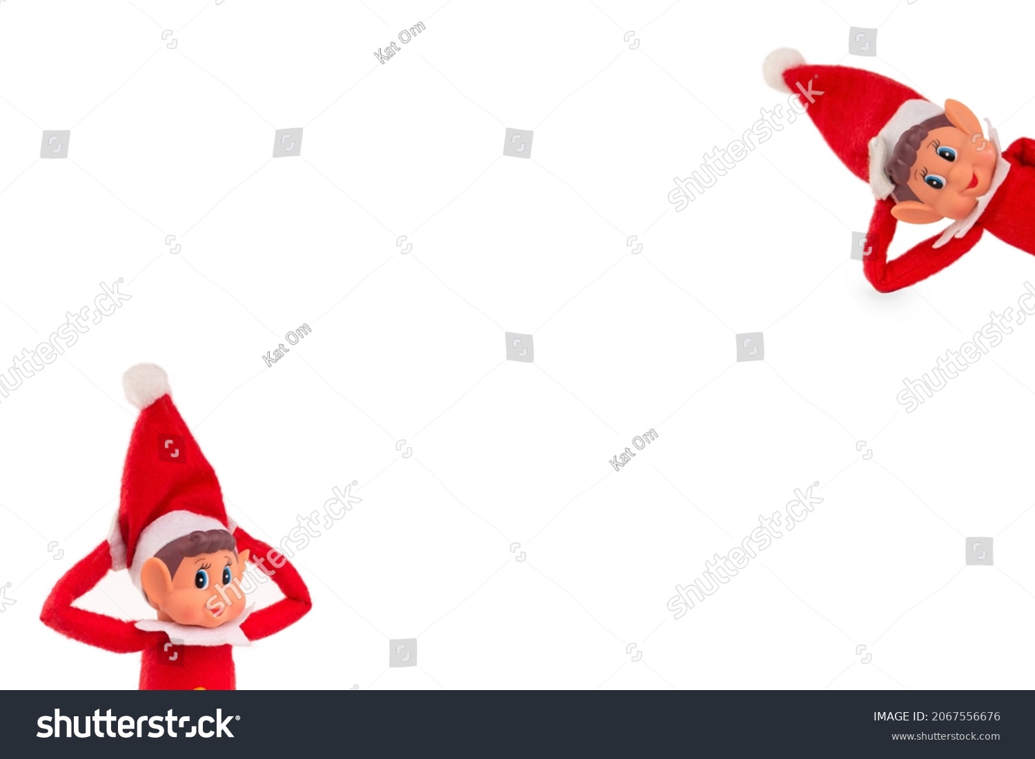 Christmas Elf toy on an isolated white background with copy space. Christmas spirit, Christmas shelf tradition. #2067556676