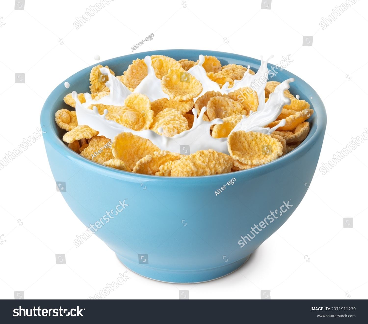 cornflakes in blue bowl. Breakfast cereal with splashing milk isolated on white background #2071911239