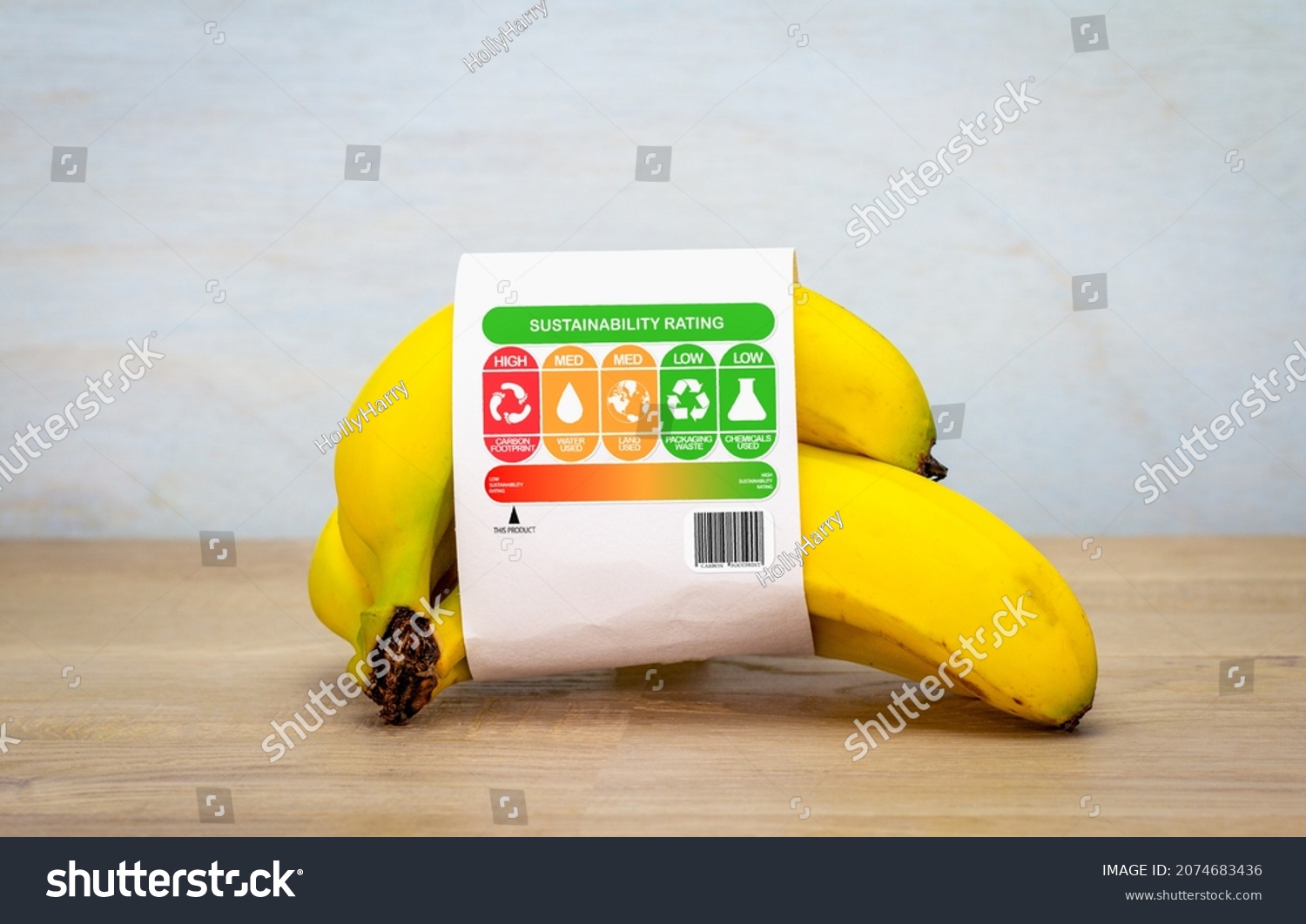 consumer food sustainability label on bananas with product rating for sustainable food ethical concept #2074683436