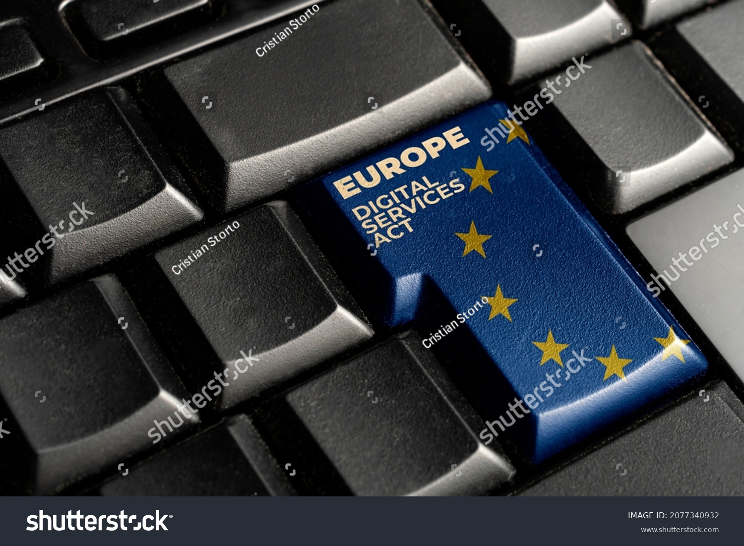 Digital services act (DSA) concept: enter key with europe flag and the text Digital Services Act #2077340932