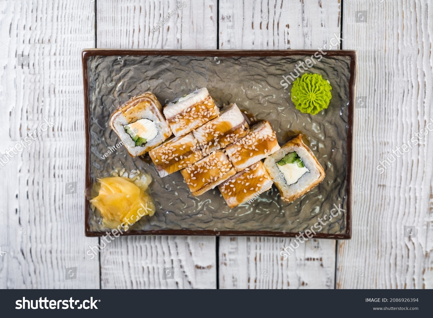 Sushi roll with smoked eel and cucumber. #2086926394