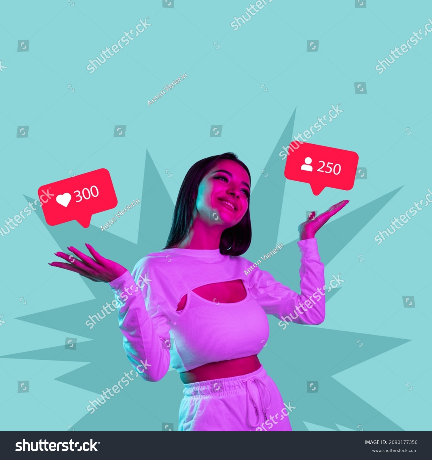 Creative design of young beautiful smiing girl having many social media popularity isolated over blue background. Concept of social media, influence, popularity, modern lifestyle and ad #2090177350