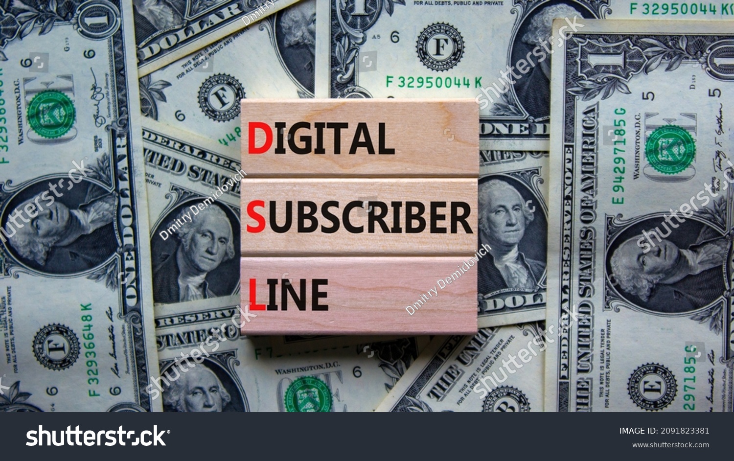 DSL digital subscriber line symbol. Concept words DSL digital subscriber line on wooden blocks. Beautiful background from dollar bills, copy space. Business and DSL digital subscriber line concept. #2091823381