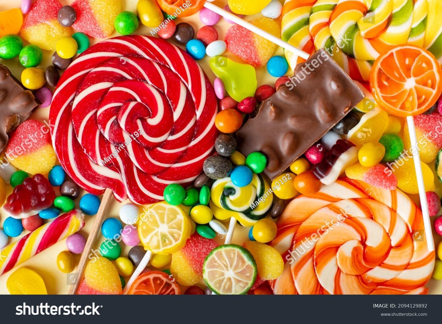 candies with jelly and sugar. colorful array of different childs sweets and treats #2094129892