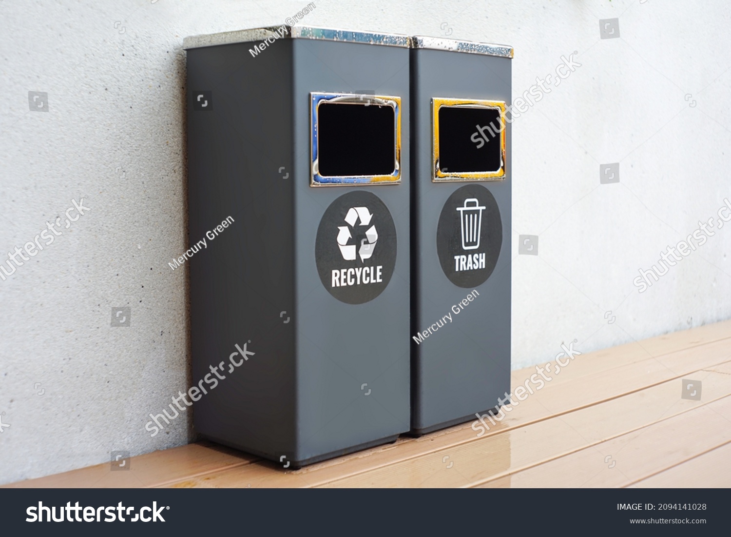 two gray trash cans with general waste and recycling on outdoor background #2094141028