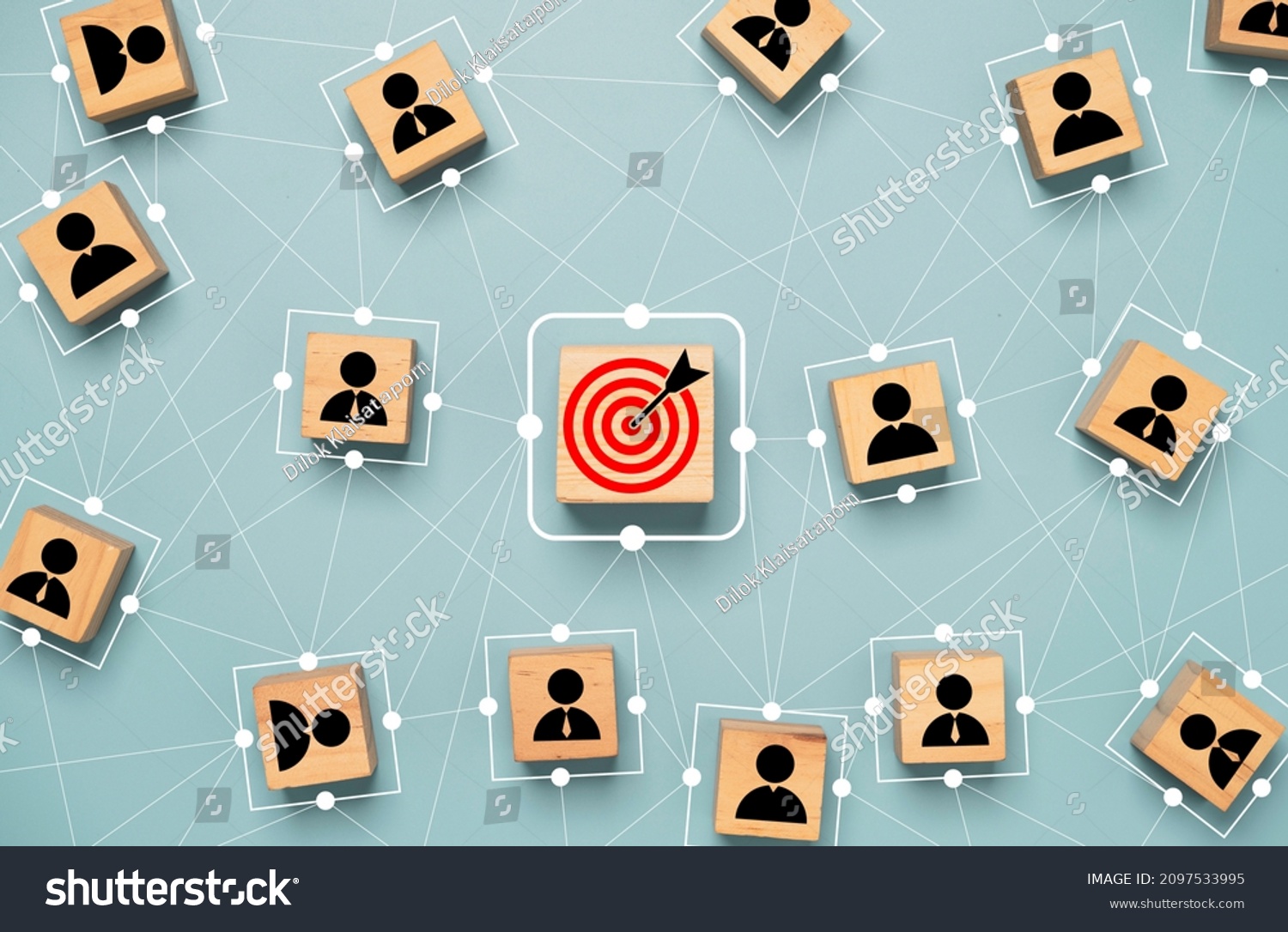 Red dartboard and black arrow connection linkage with human icon for customer focus target group and customer relation management concept. #2097533995