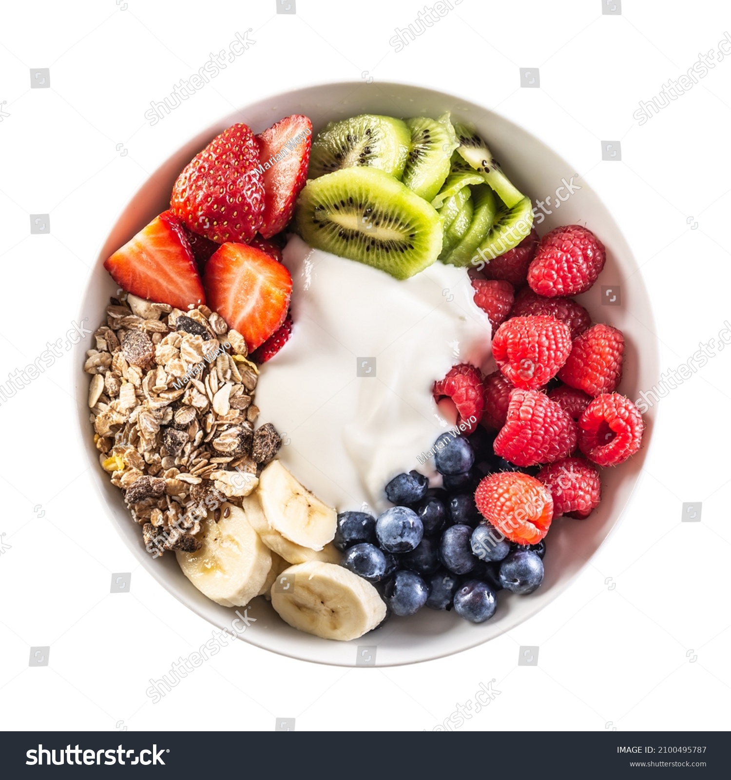 Top view of isolated fruit and yoghurt bowl with cereals, kiwi, strawberries, banana, blueberries and raspberries. #2100495787