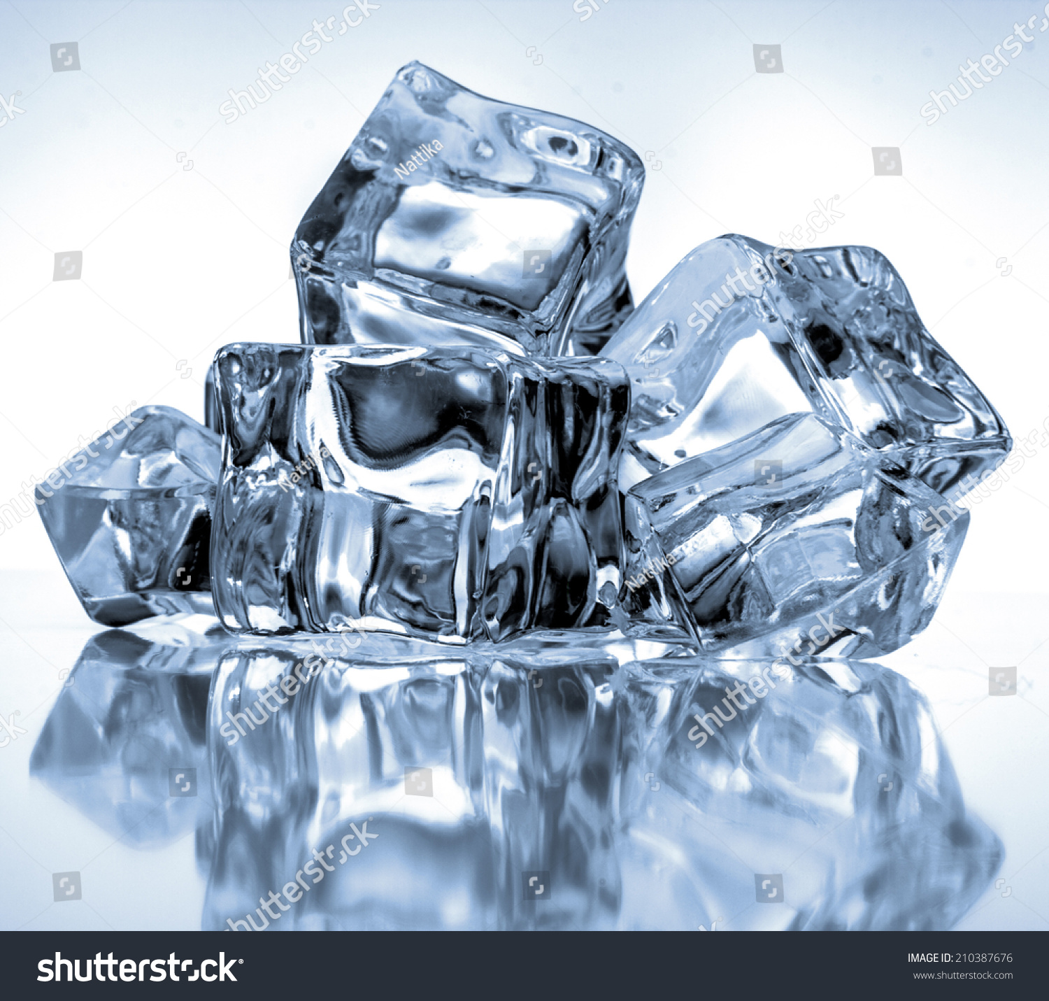Ice cubes on blue background #210387676
