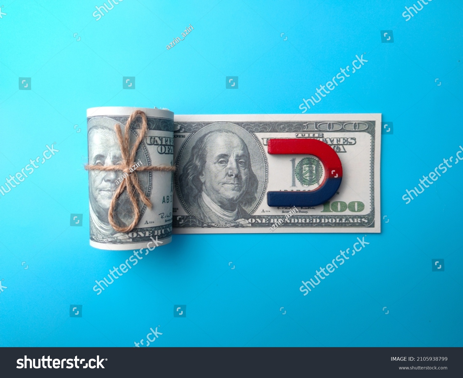 Dollar banknotes money and red blue magnet. Money laundering #2105938799