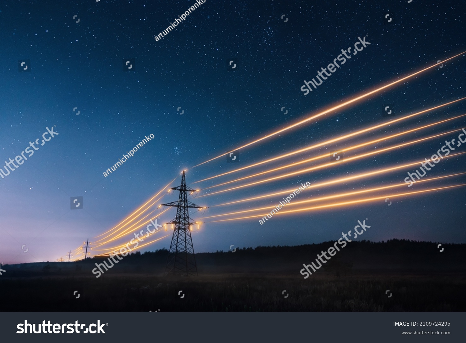 Electricity transmission towers with orange glowing wires the starry night sky. Energy infrastructure concept. #2109724295