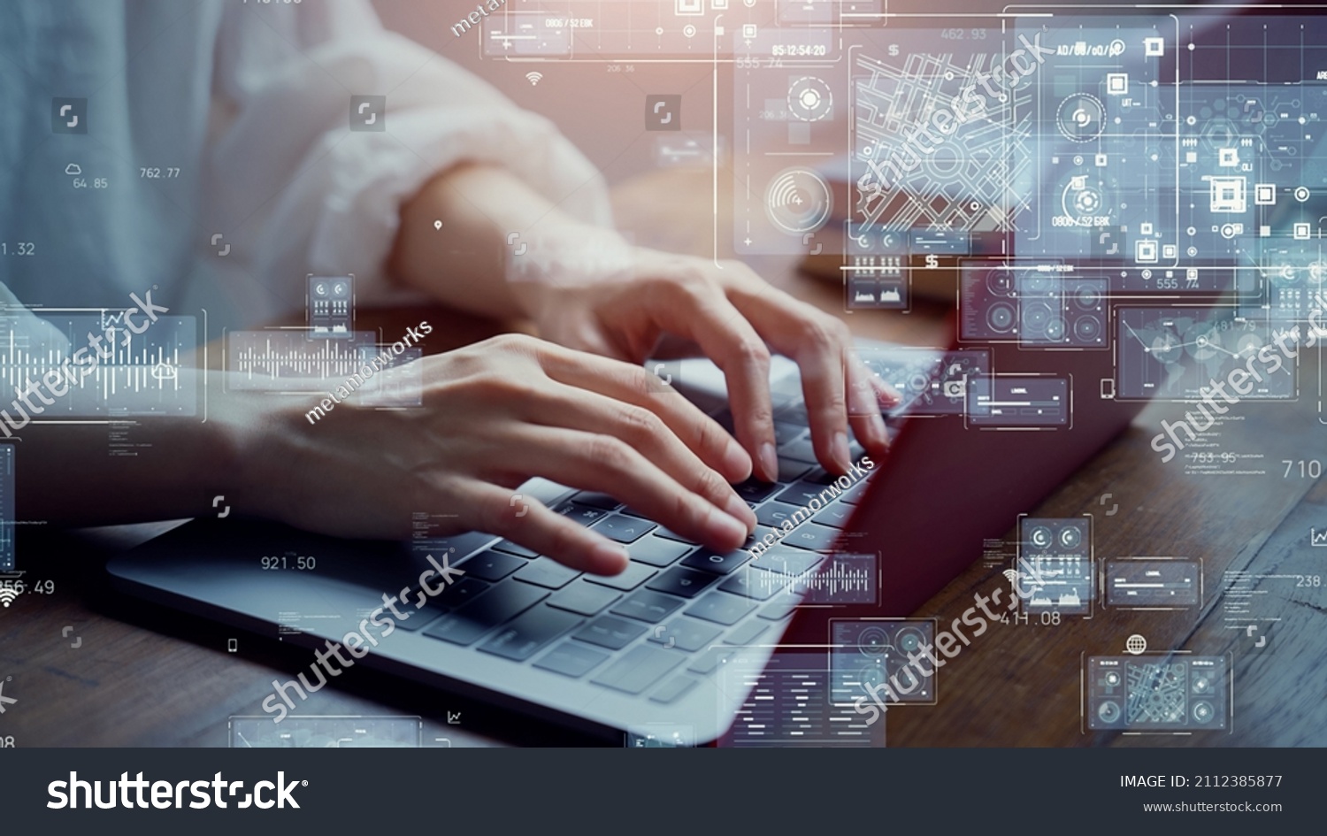 Business and technology concept. Woman typing a keyboard. Digital transformation. #2112385877