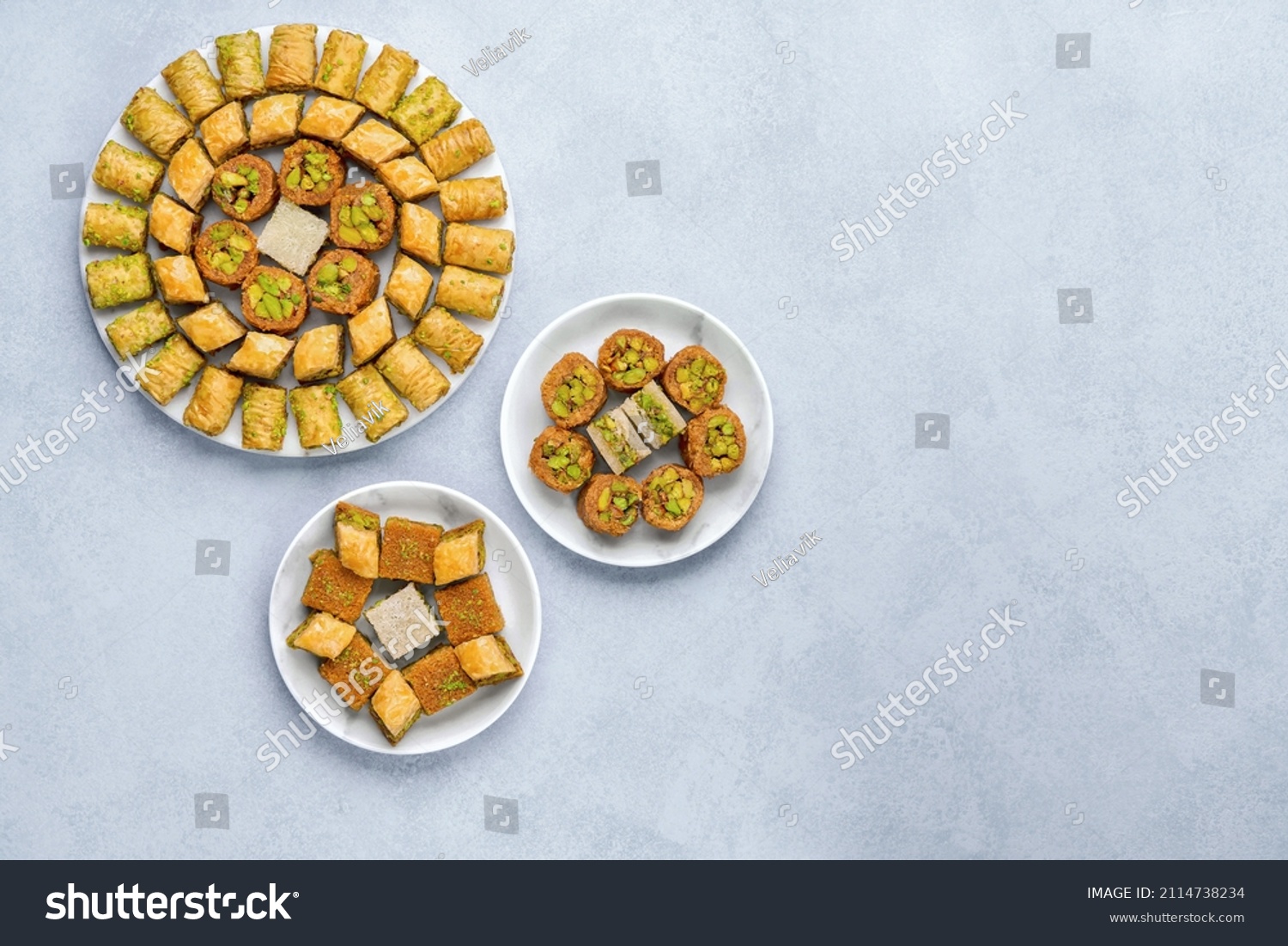 Traditional turkish, arabic dessert baklava assortment with pistachio. Ramadan sweets. Top view, copy space #2114738234