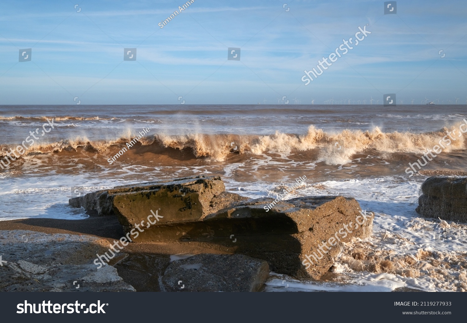 Waves heading towards a beach
 #2119277933
