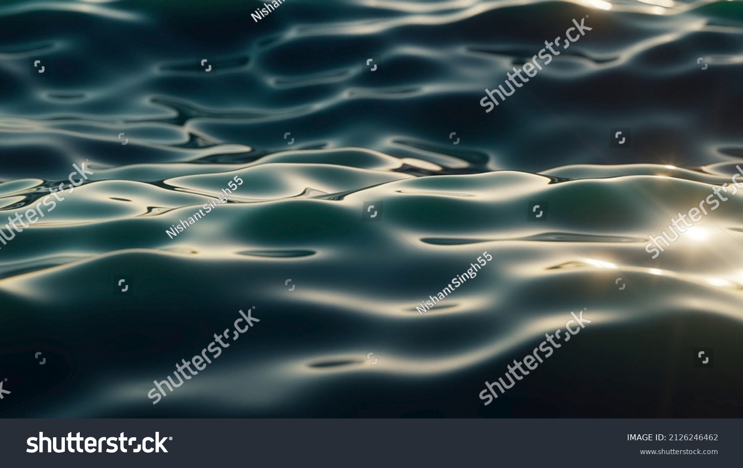 green water flowing in a river. river closeup and sunshine on river #2126246462