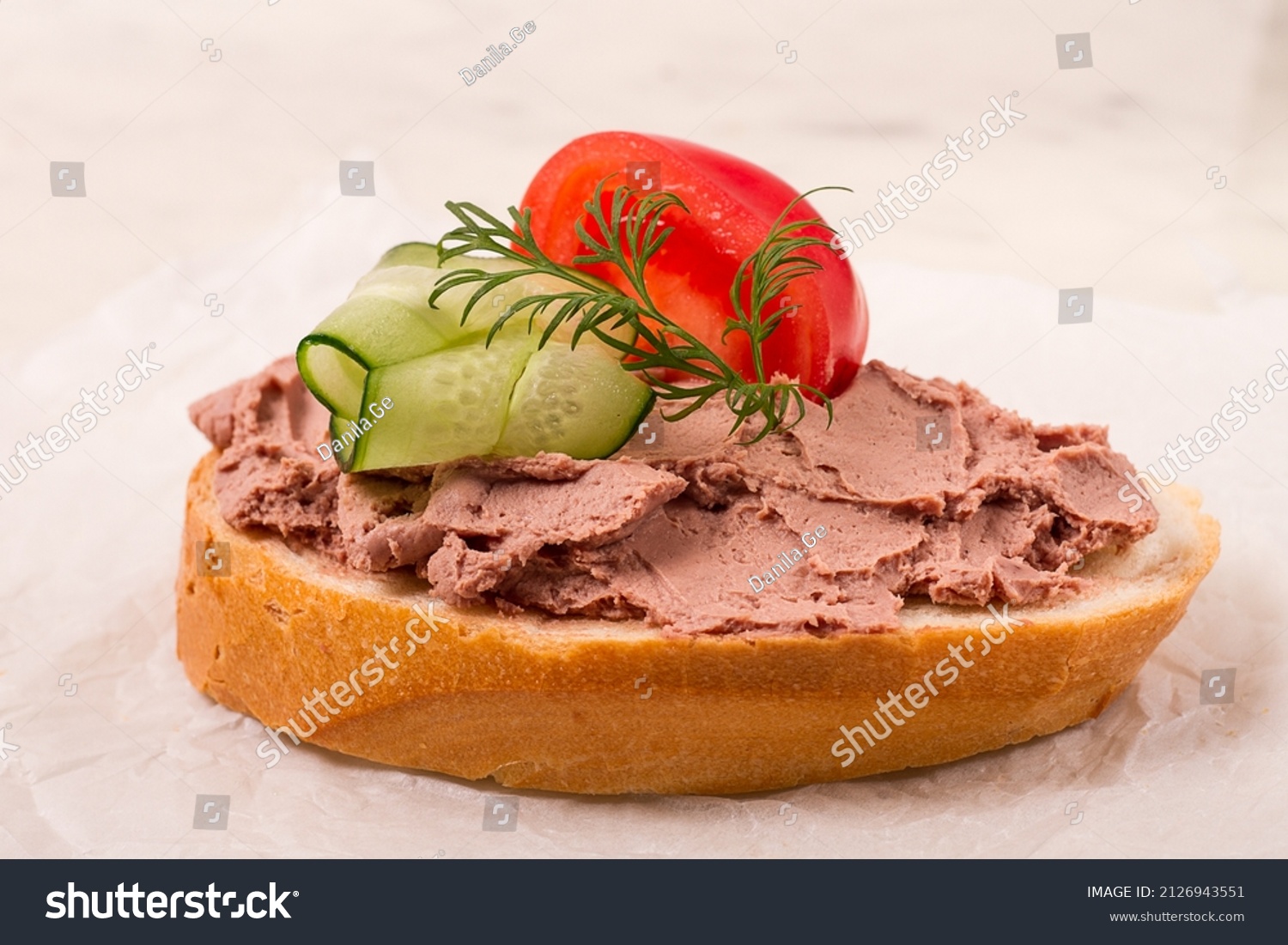 Liver meat pate spread, on white bread, on a light background, breakfast, close-up, no people, selective focus, pasticcio, pastete, #2126943551