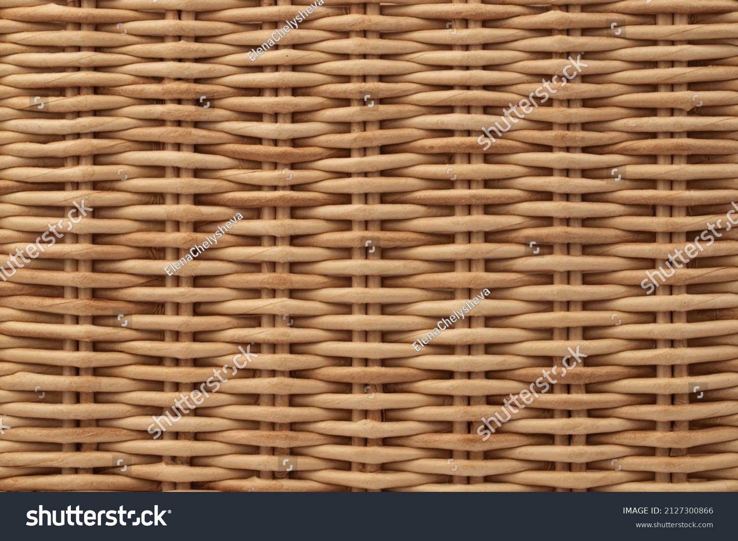 a fragment of a basket made of willow twigs or garden furniture, texture #2127300866