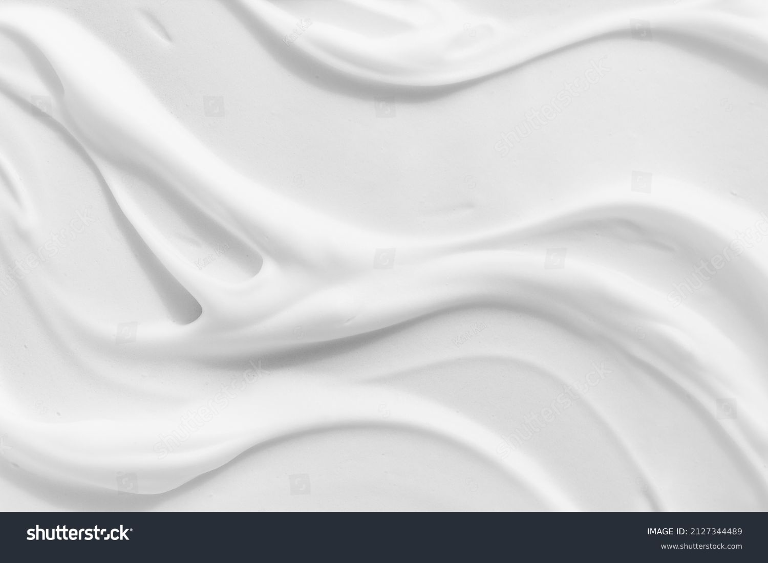 White foam cream texture. Cosmetic cleanser, shower gel, shaving foam background. Creamy cleansing skincare product bubbles #2127344489
