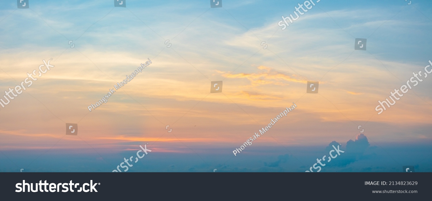 Panorama photo of clouds or cloudscape at sunset or evening time. with blue sky. #2134823629