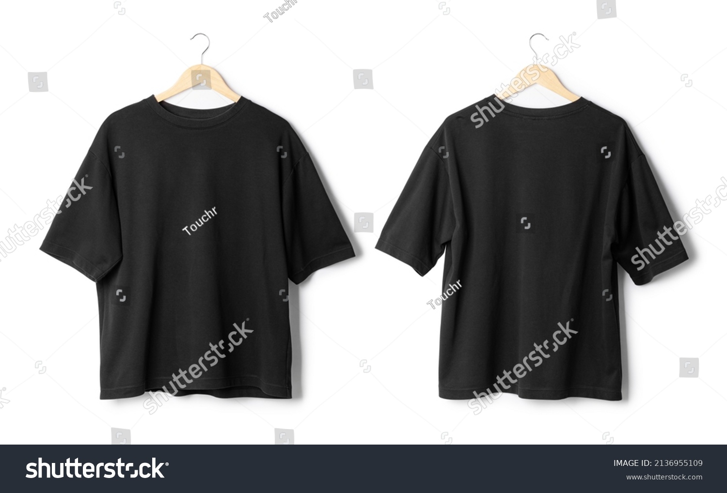 Black oversize T shirt mockup hanging isolated on white background with clipping path. #2136955109