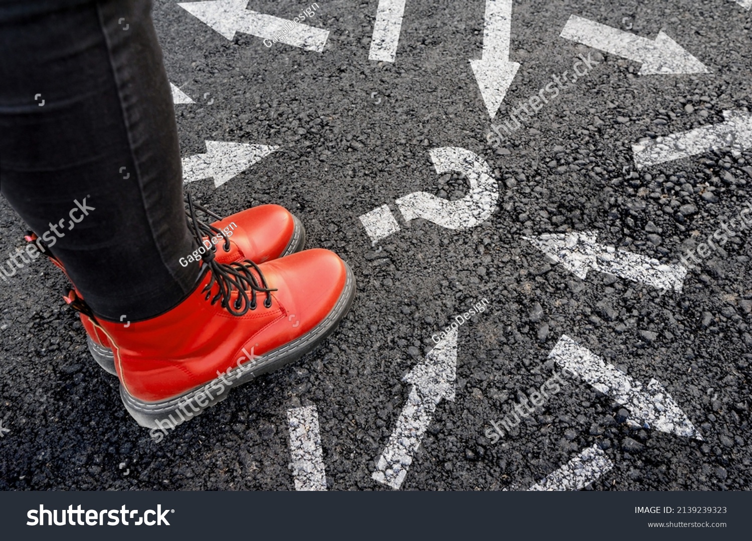 woman in boots standing on asphalt next to multitude of arrows in different directions and question mark, confusion choice chaos concept #2139239323