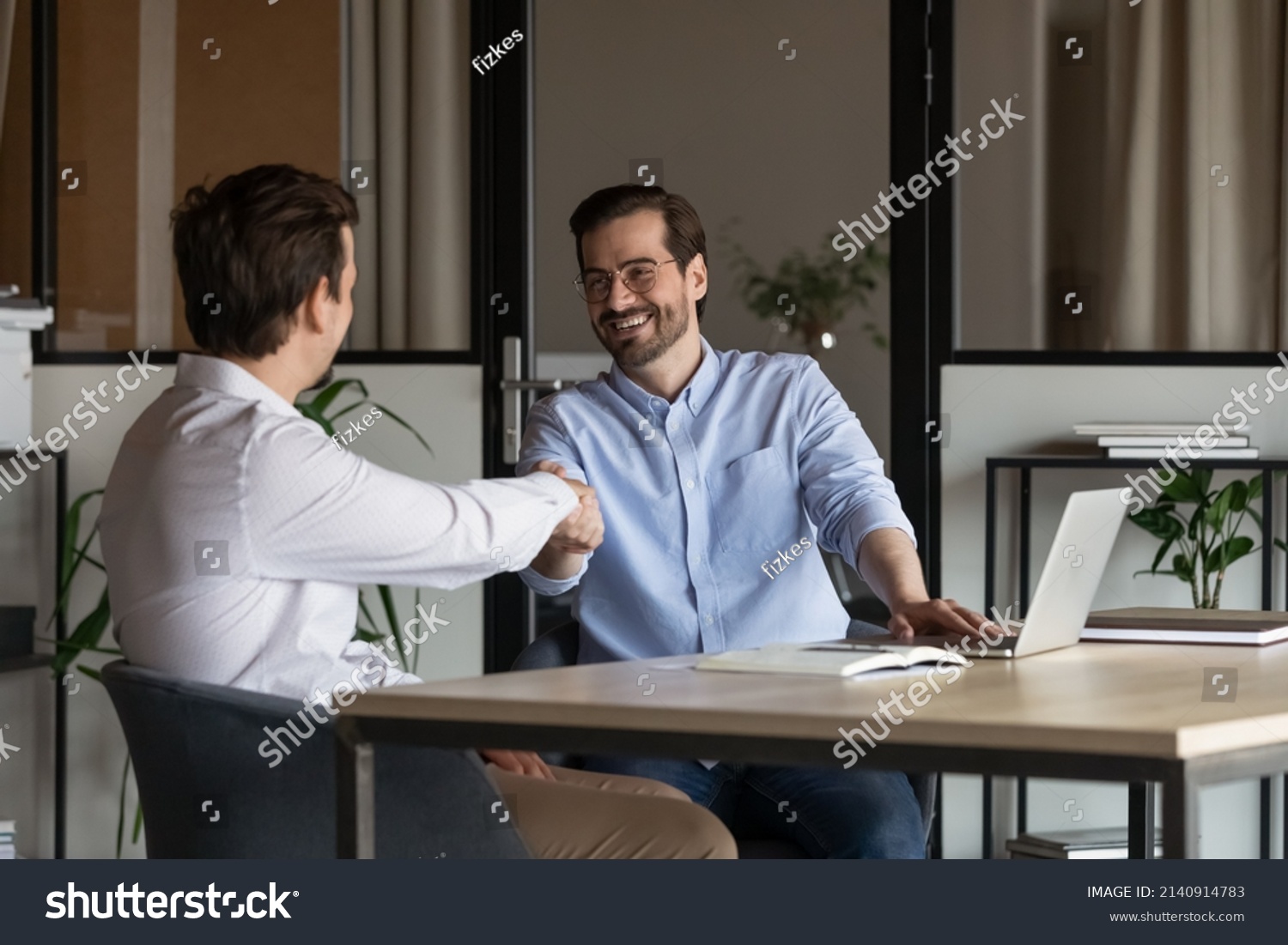 Employer, boss hiring candidate after successful job interview. Happy customer and lawyer, finishing consultation, meeting, shaking hands. Happy business men giving handshakes after negotiations #2140914783