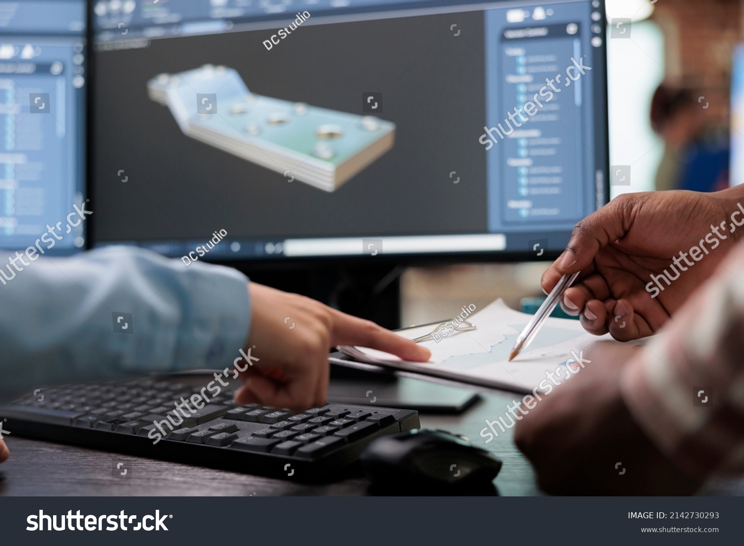 Close up of creative industry employees with clipboard and advanced 3D modeling software open in background. 3D digital artists reviewing sketch scene plan and simulated render times, #2142730293