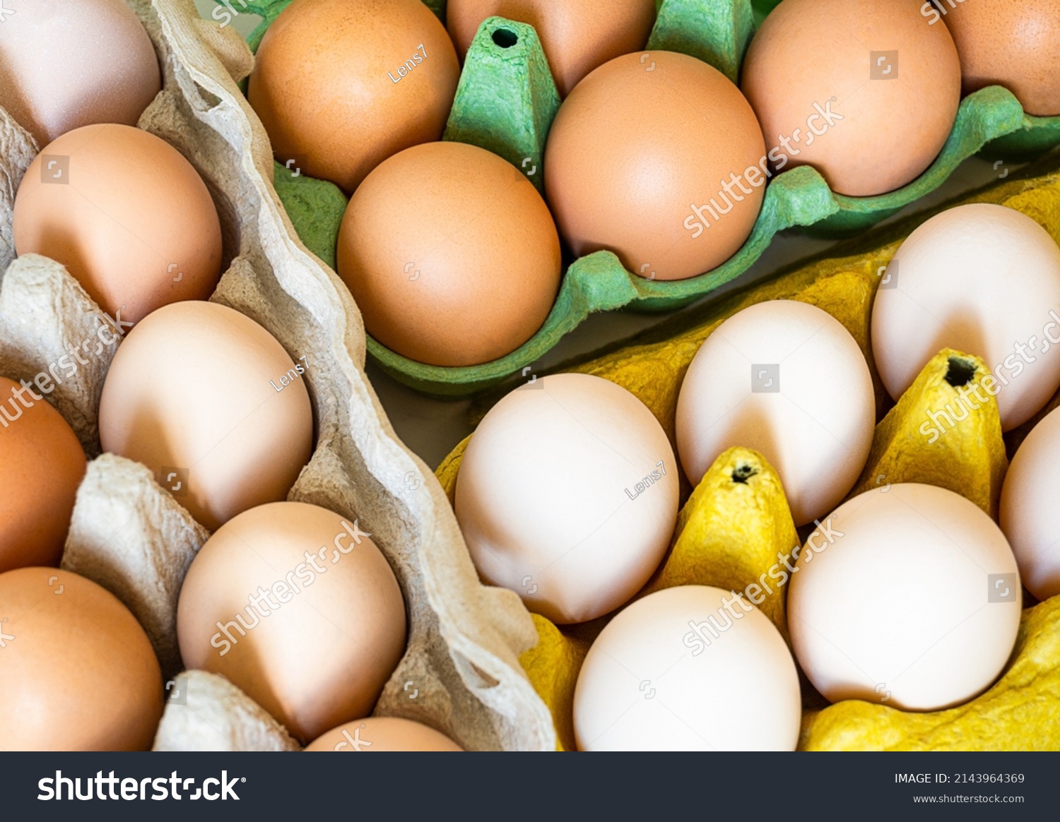 different categories of eggs in trays. top view. #2143964369
