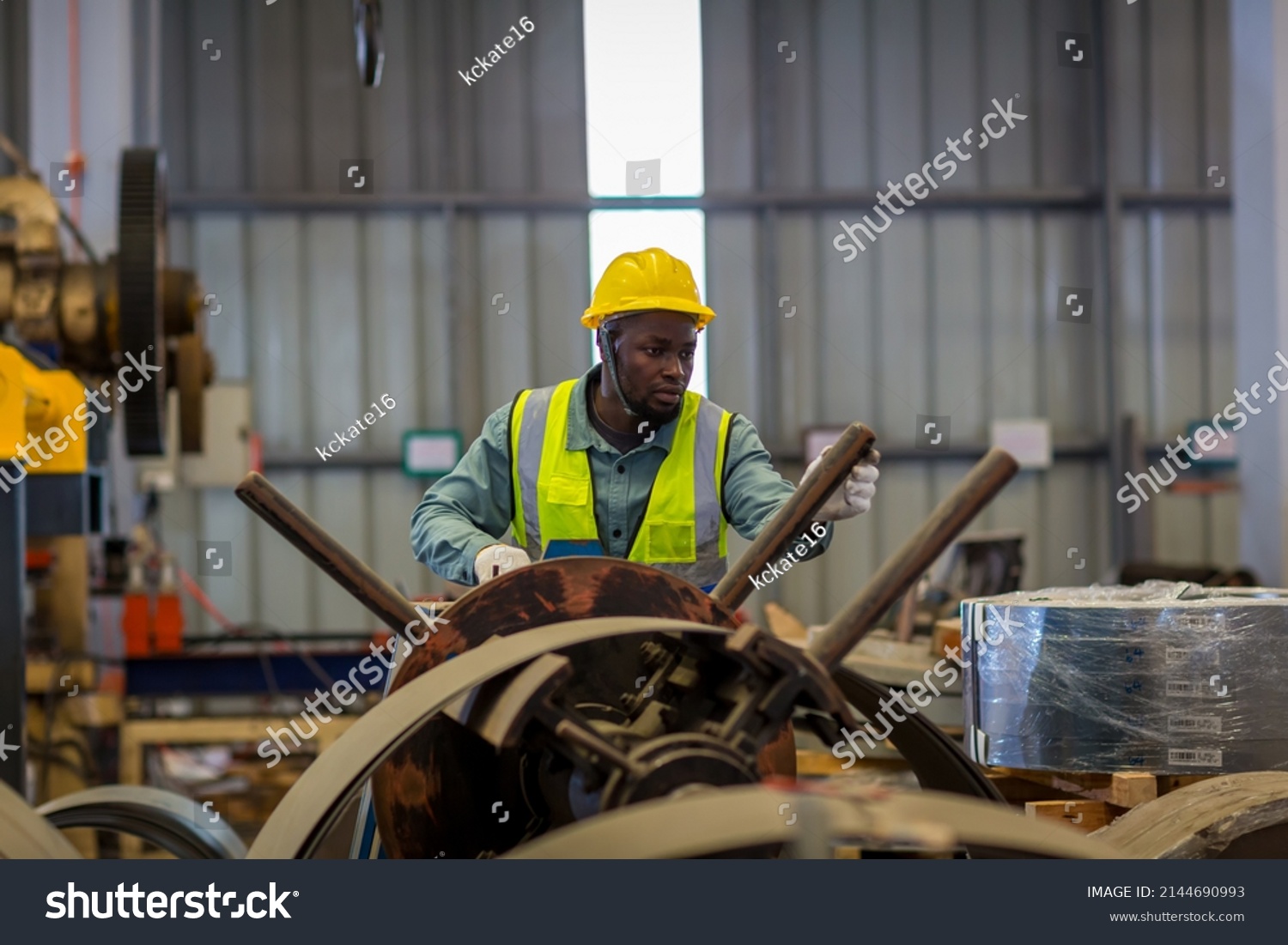 Foreman or worker work at factory site check up machine or products in site. Engineer or Technician checking Material or Machine on Plant. Industrial and Factory. #2144690993