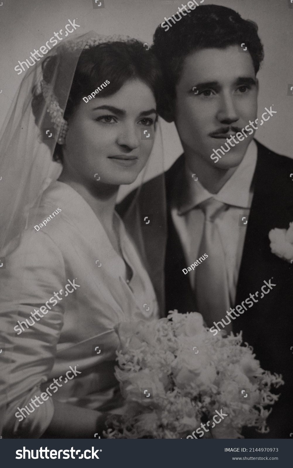 vintage wedding photo from the 50's.nostalgia of husband and wife.concept of past times and memories of other times. #2144970973