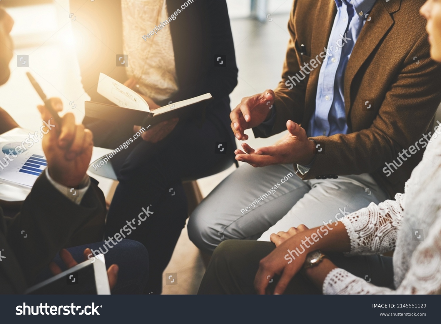 Debate skills are important in selling a product. Cropped shot of a group of unrecognizable businesspeople sitting in a meeting. #2145551129