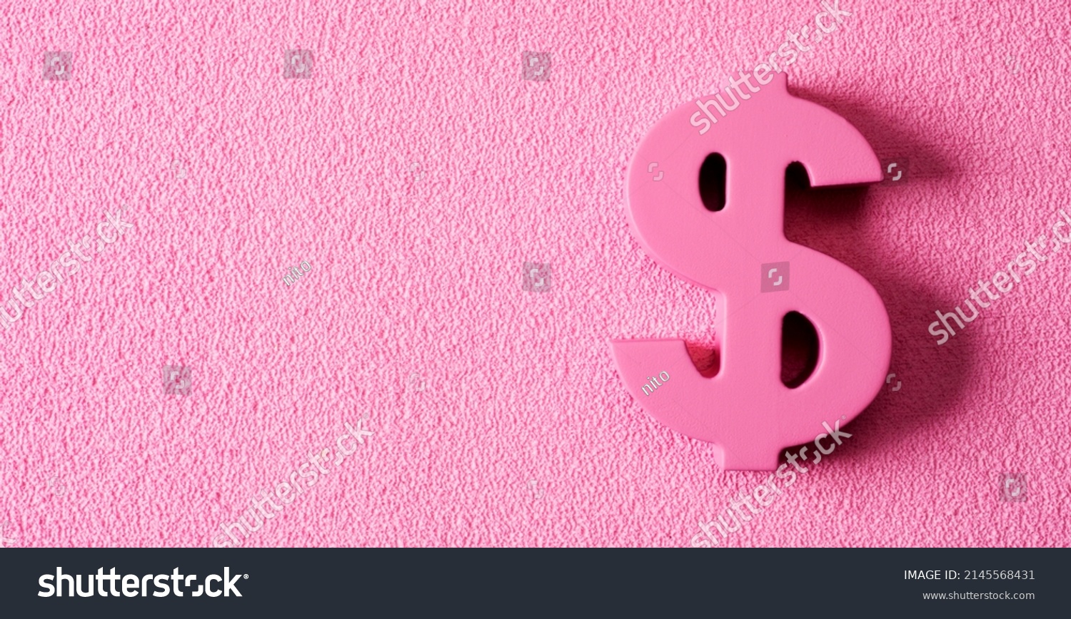 a pink dollar sign, depicting concepts such as pink money or pink capitalism, on a textured pink background with some blank space on the left #2145568431