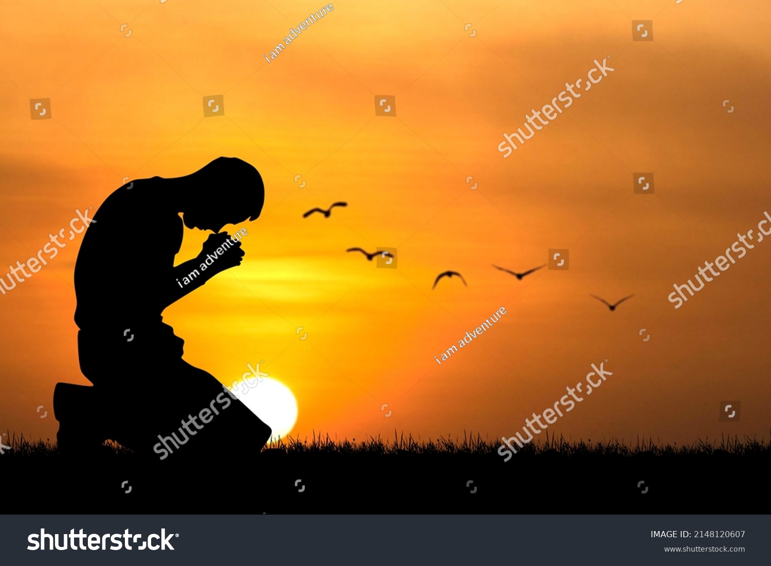 Silhouette of Christian Praying Hands Spiritual and Religious People Praying to God Christianity Concepts #2148120607