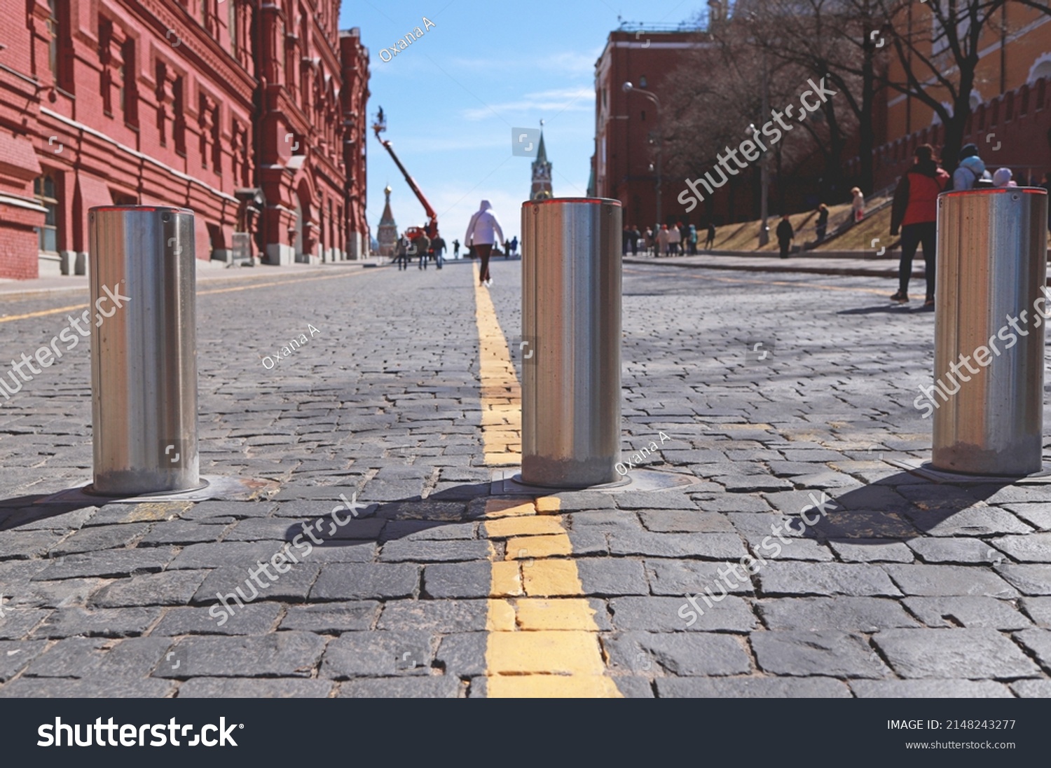 Moscow: Poles of Traffic blockers. Enter to Red Square via Kremlin passage (Kremlevsky proezd). Protection against the passage of vehicles. Steel automatic traffic blockers. #2148243277