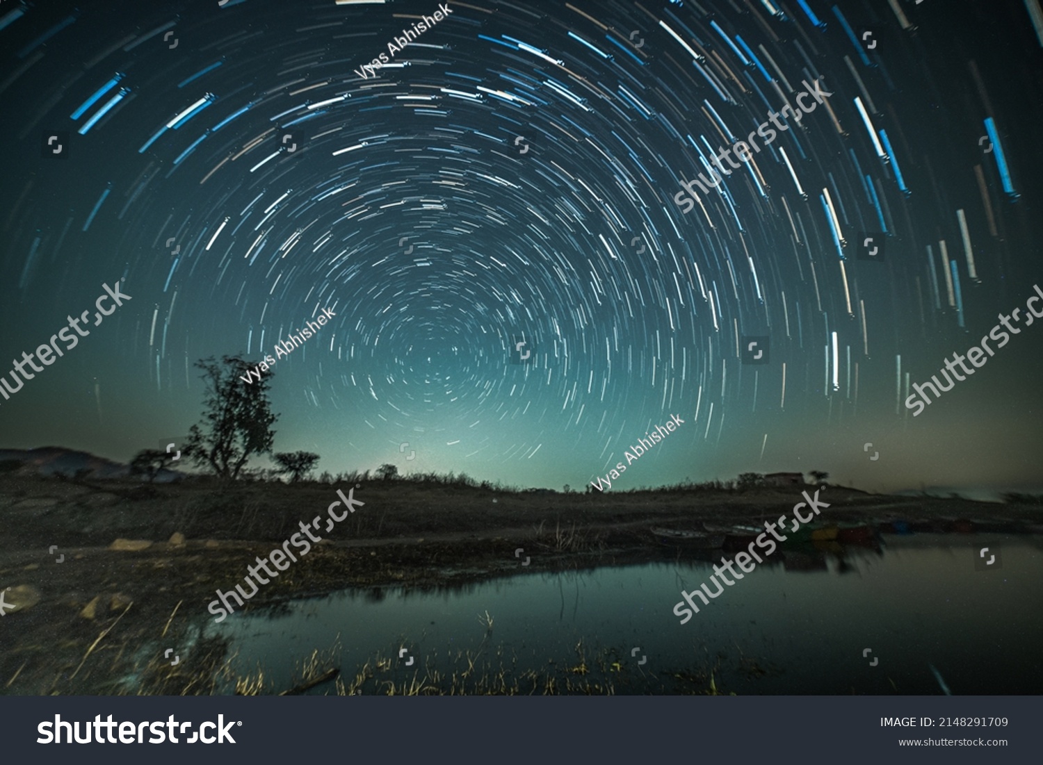Circular star trails over the lake. Astro photography and Nightscape photography at Mandan Lake, Rajpipla, Gujarat #2148291709
