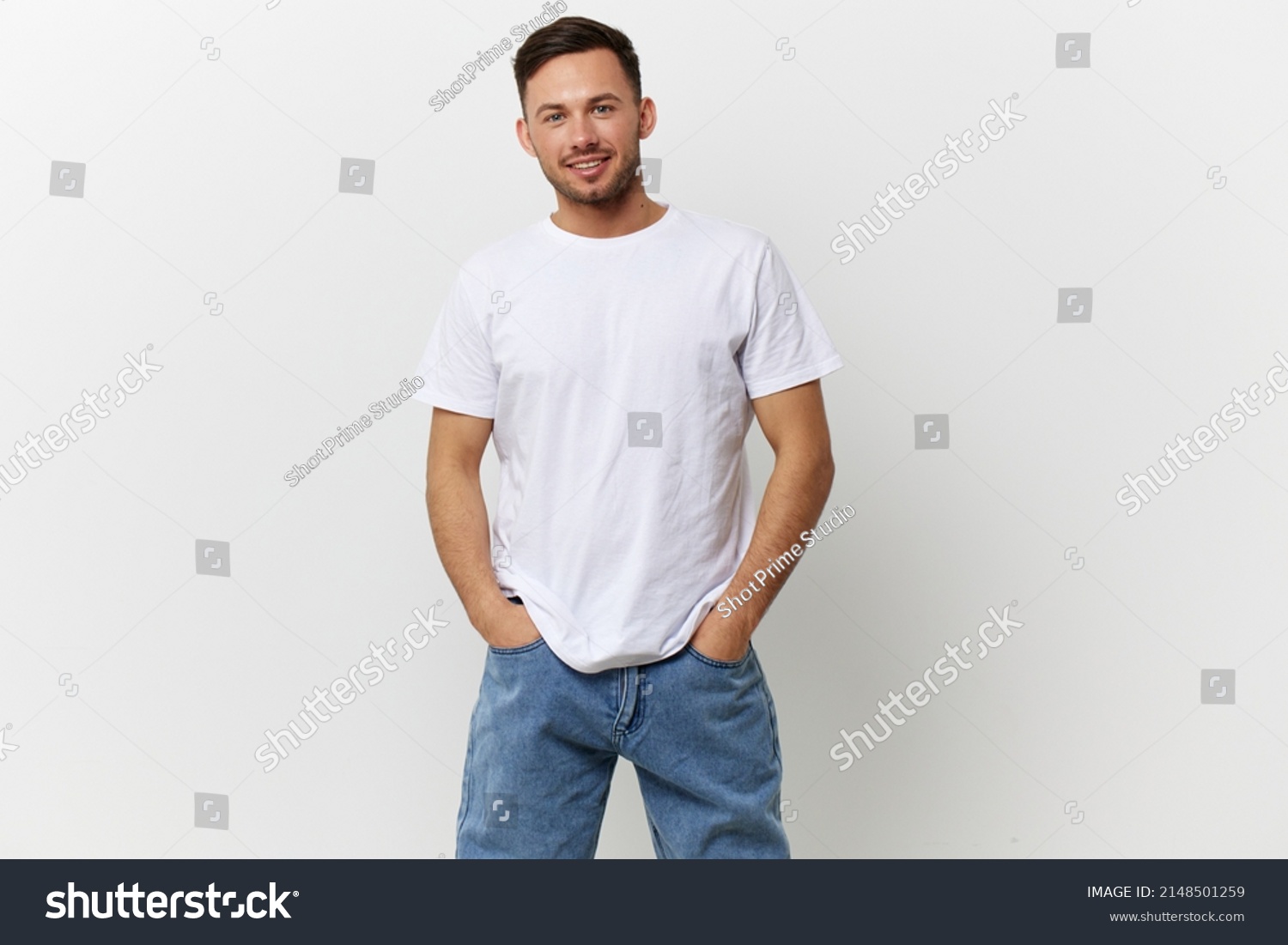 Happy cheerful tanned handsome man in basic t-shirt smile at camera posing isolated on over white studio background. Copy space Banner Mockup. People emotions Lifestyle concept. Model snapshots #2148501259