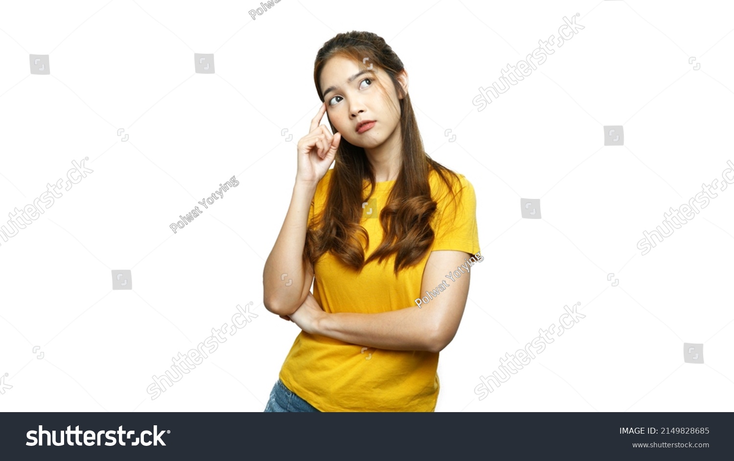 Young Asian woman thinking and pointing head, white background. The concept of perception. #2149828685