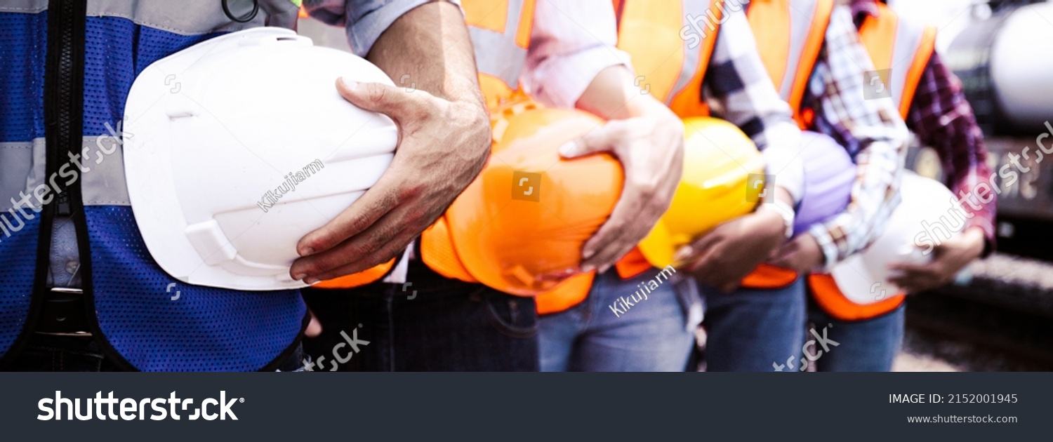 Quality engineers or construction teamwork.Safety PPE concern for engineering or building work site or plant.Wearing helmet and protective equipment can safe workers life in industrial work or plant. #2152001945