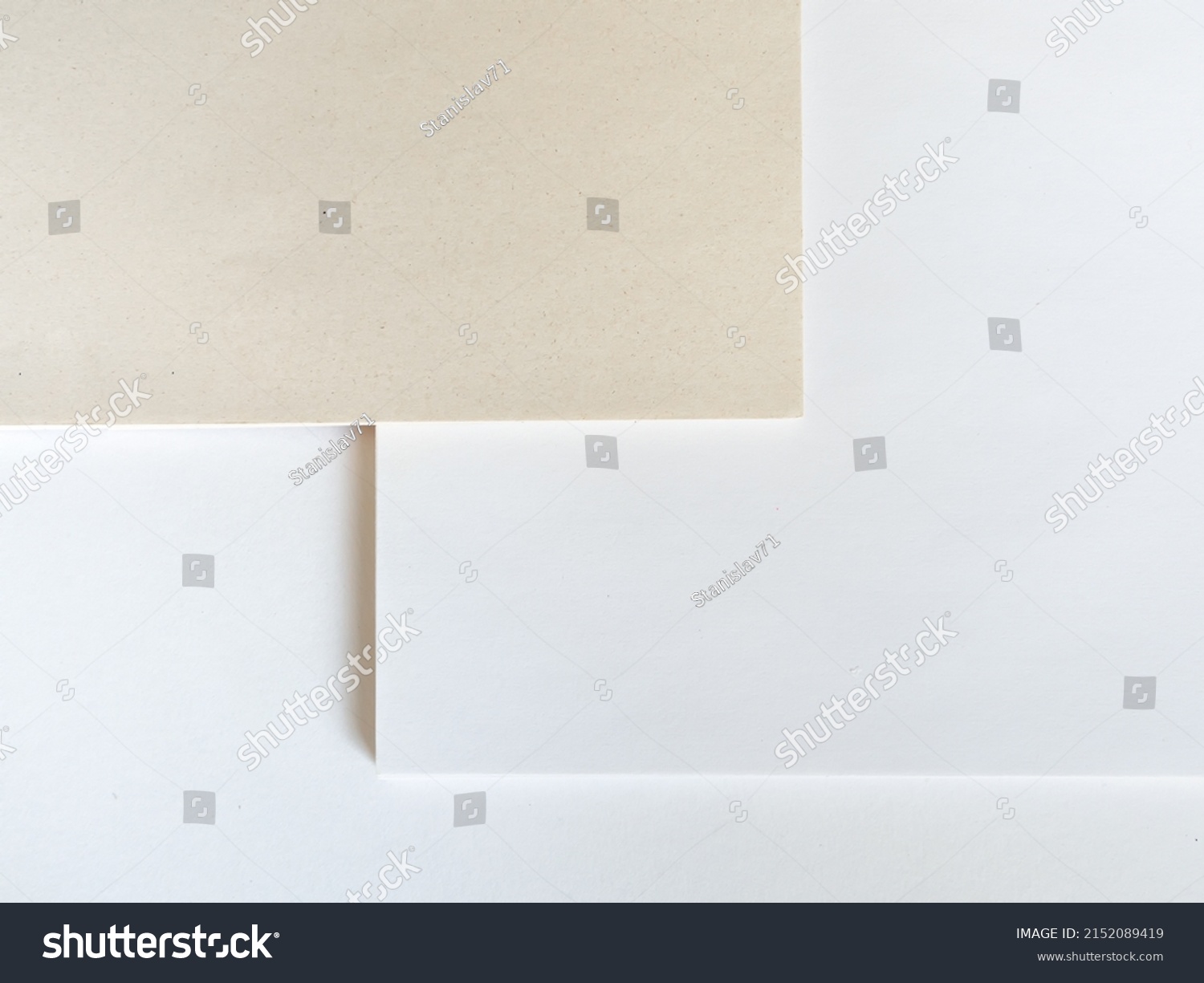 Paper without bleaching in comparison with ordinary white of high quality. White recycled paper background or texture. Import substitution. Flat lay, copy space #2152089419