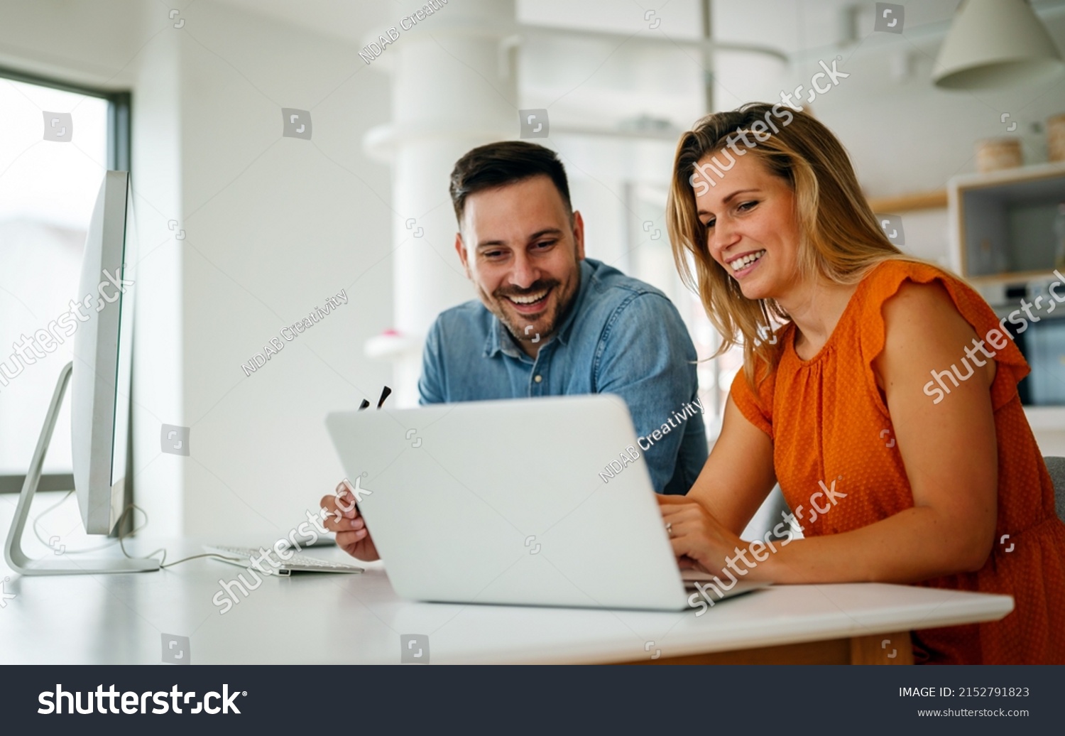 Portrait of success business people working together in home office. Couple teamwork startup concept #2152791823