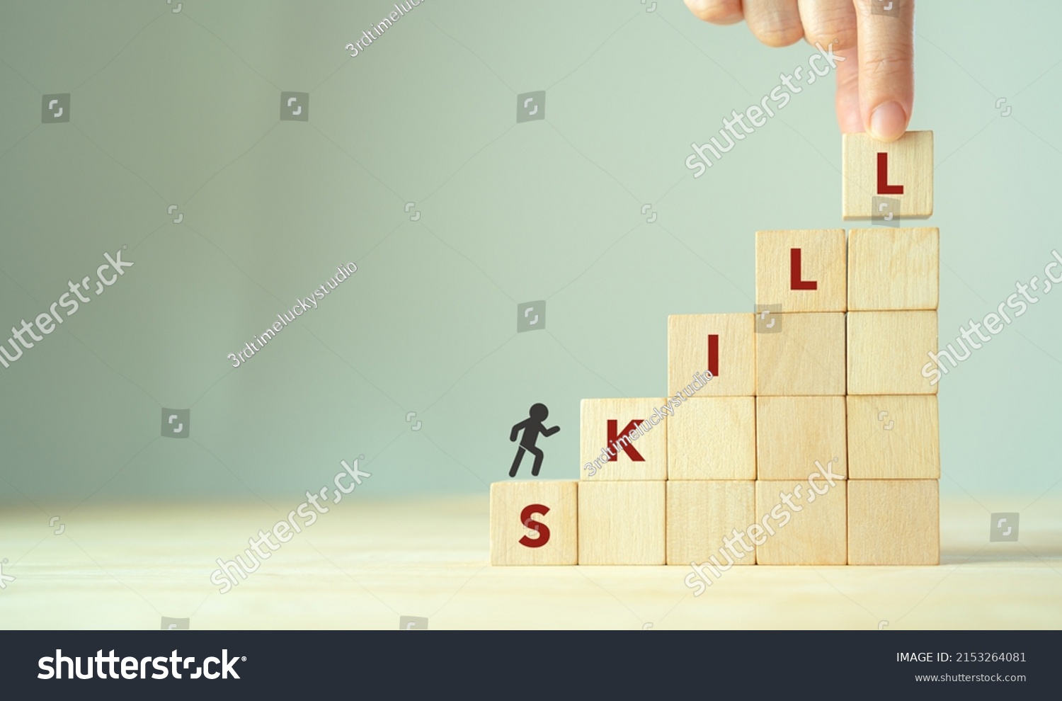 Upskilling and personal development concept. Skill training, education, learning, ability, knowledge and competency  for digital transformantion. Upskilling, reskilling, new skills icon on wooden cube #2153264081