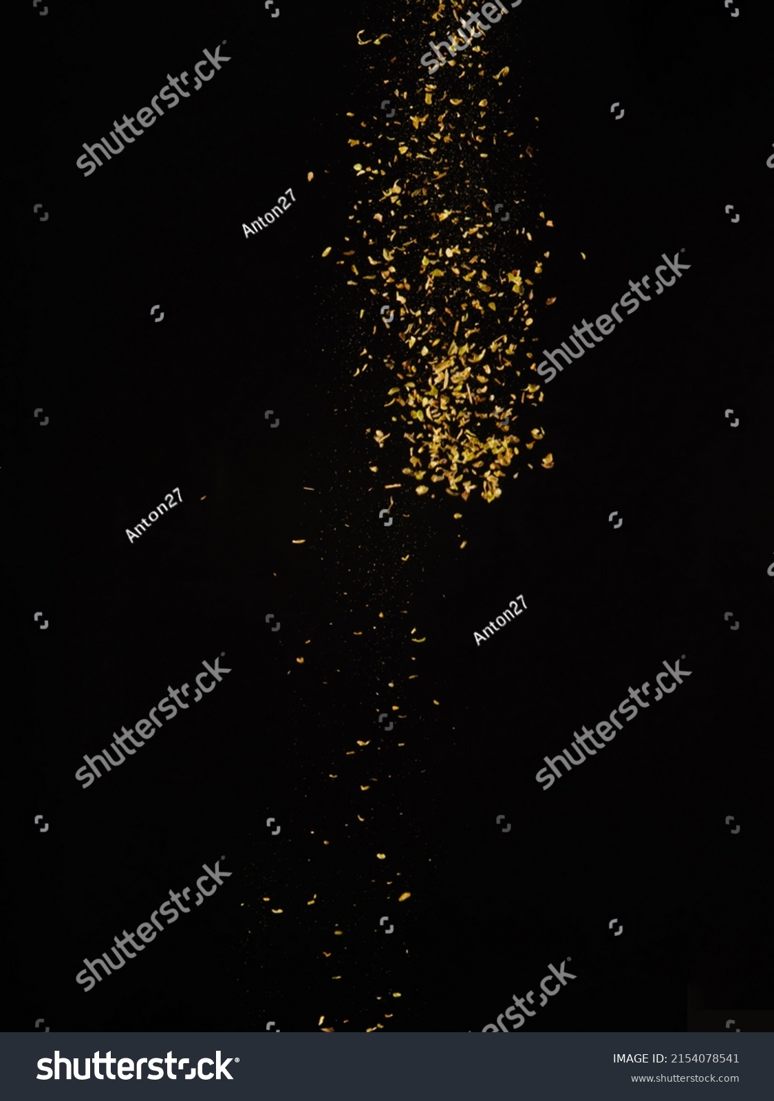 Aromatic spices in free flight on a black background. The concept is spices, seasonings, aromatic additives. Recipes for restaurant and home cooking. Minimalism. Abstraction. #2154078541