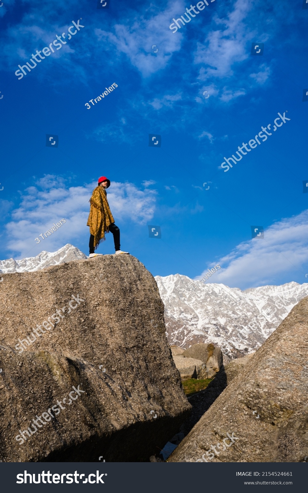Hiker on top of the mountain in Triund Trek, Himachal Pradesh, India.  #2154524661