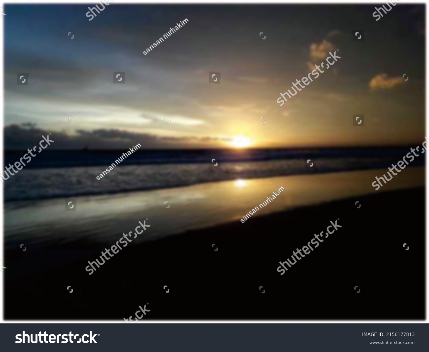 defocused abstract background of sunset at batukaras #2156177813