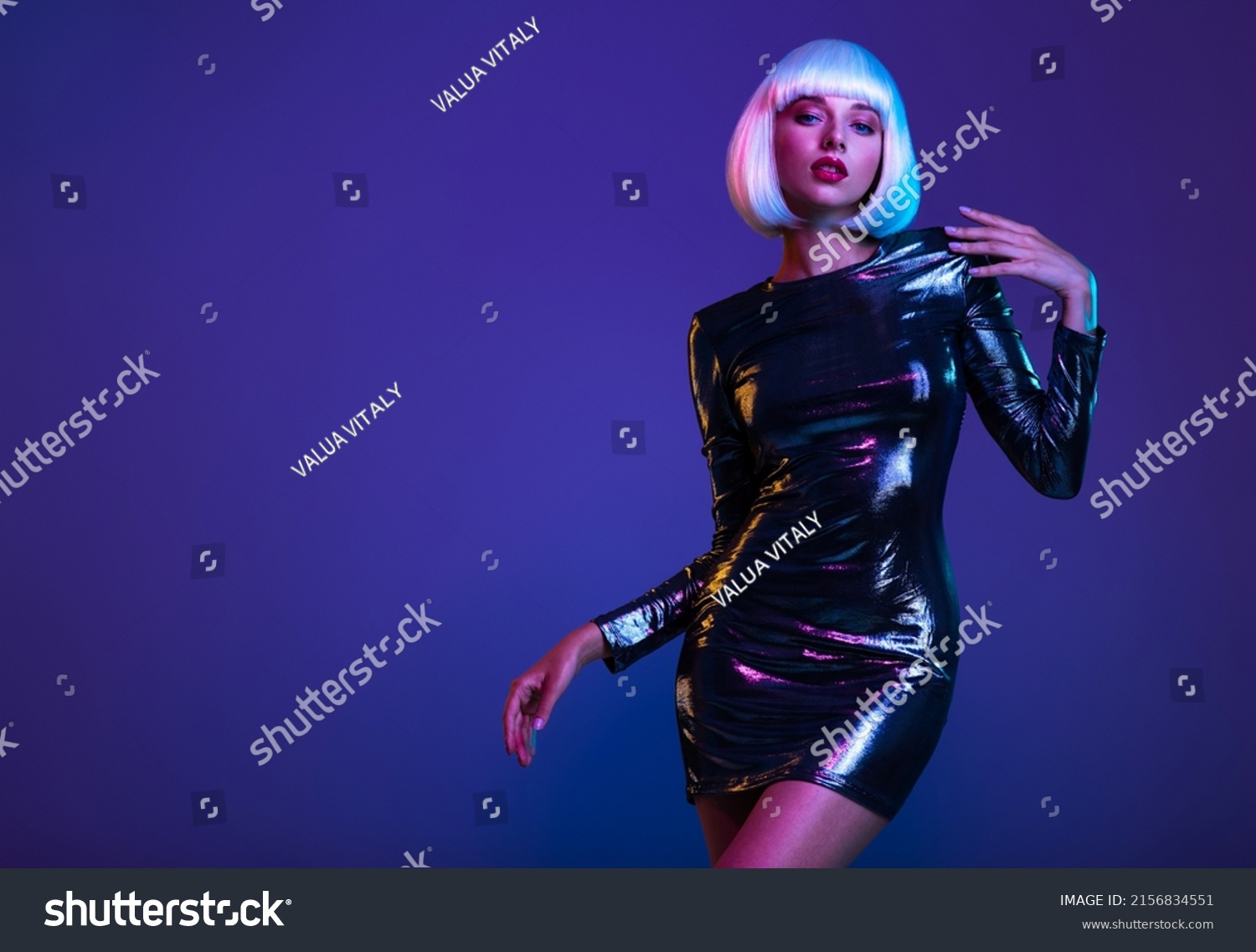 Full-length portrait of beautiful  fashionable woman in shining dress, space concept. Art portrait  of  an young attractive model.  Stylish blonde in shiny dress. Fantasy style. Glamour fashion girl   #2156834551