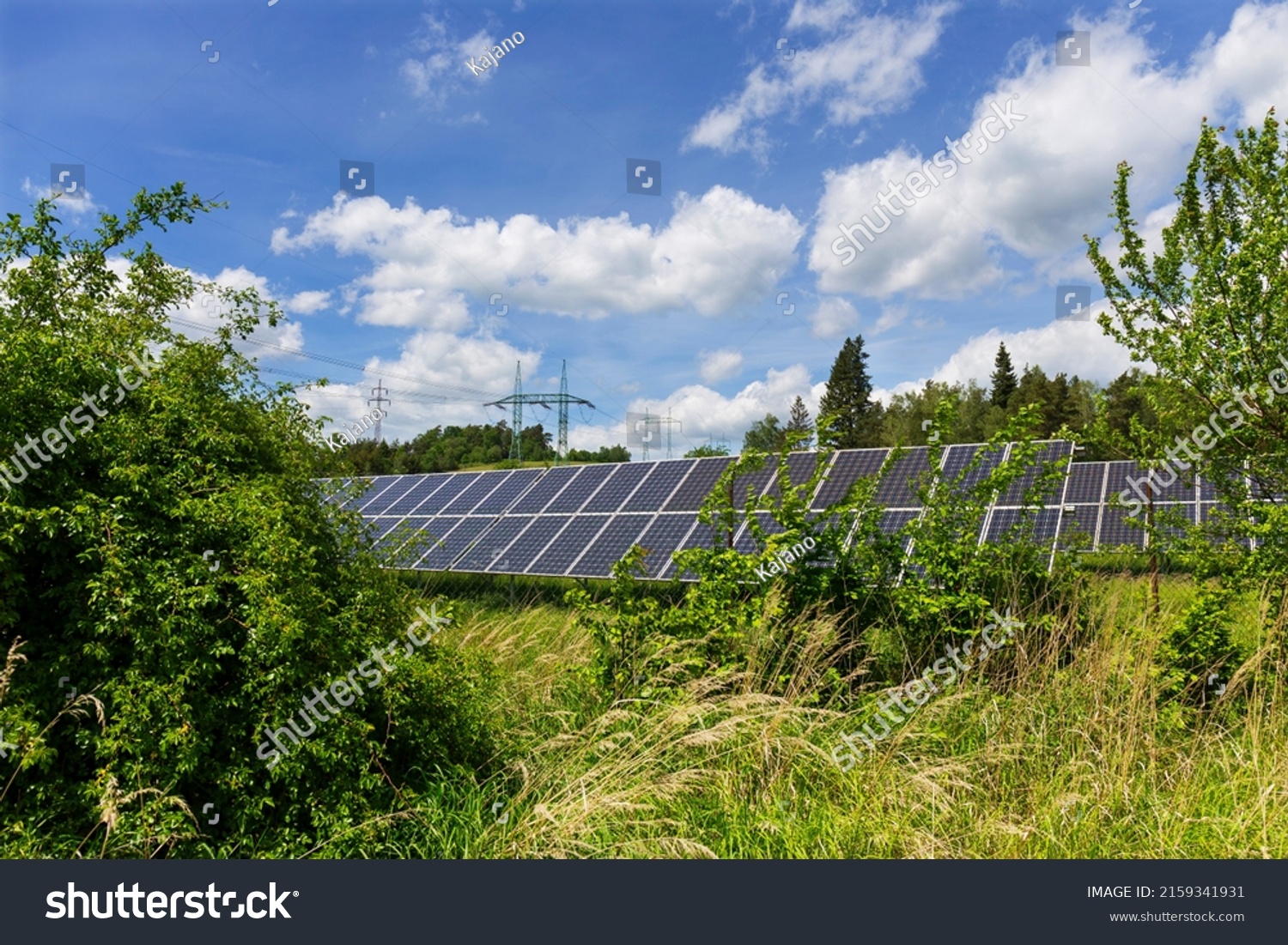 Solar Power Station in the sunny cloudy spring Nature #2159341931