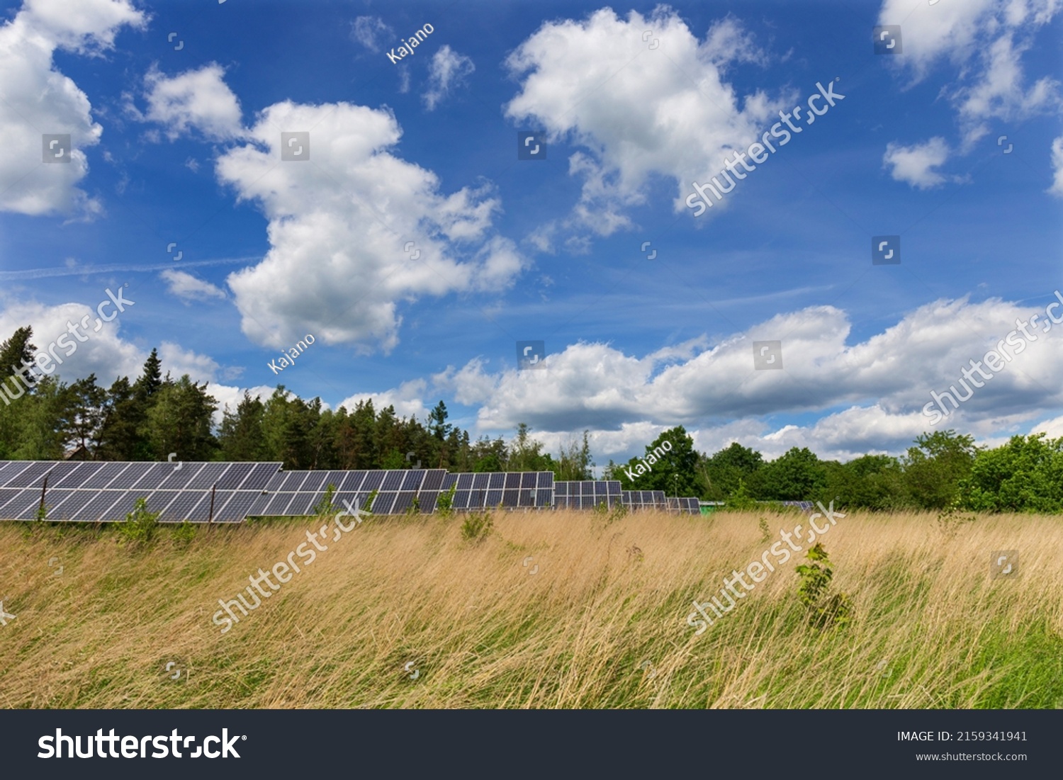 Solar Power Station in the sunny cloudy spring Nature #2159341941