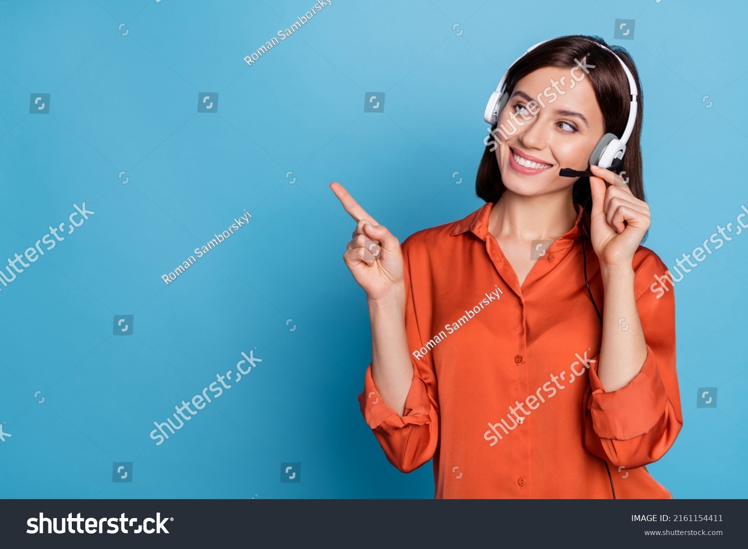 Portrait of attractive trendy cheerful girl help desk service showing copy space isolated over bright blue color background #2161154411
