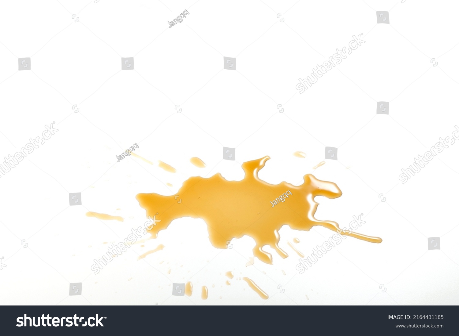 Liquid stain dirty splashing on floor. Tea or coffee stain splash on white background. Yellow brown stain of  liquid pouring on white surface #2164431185