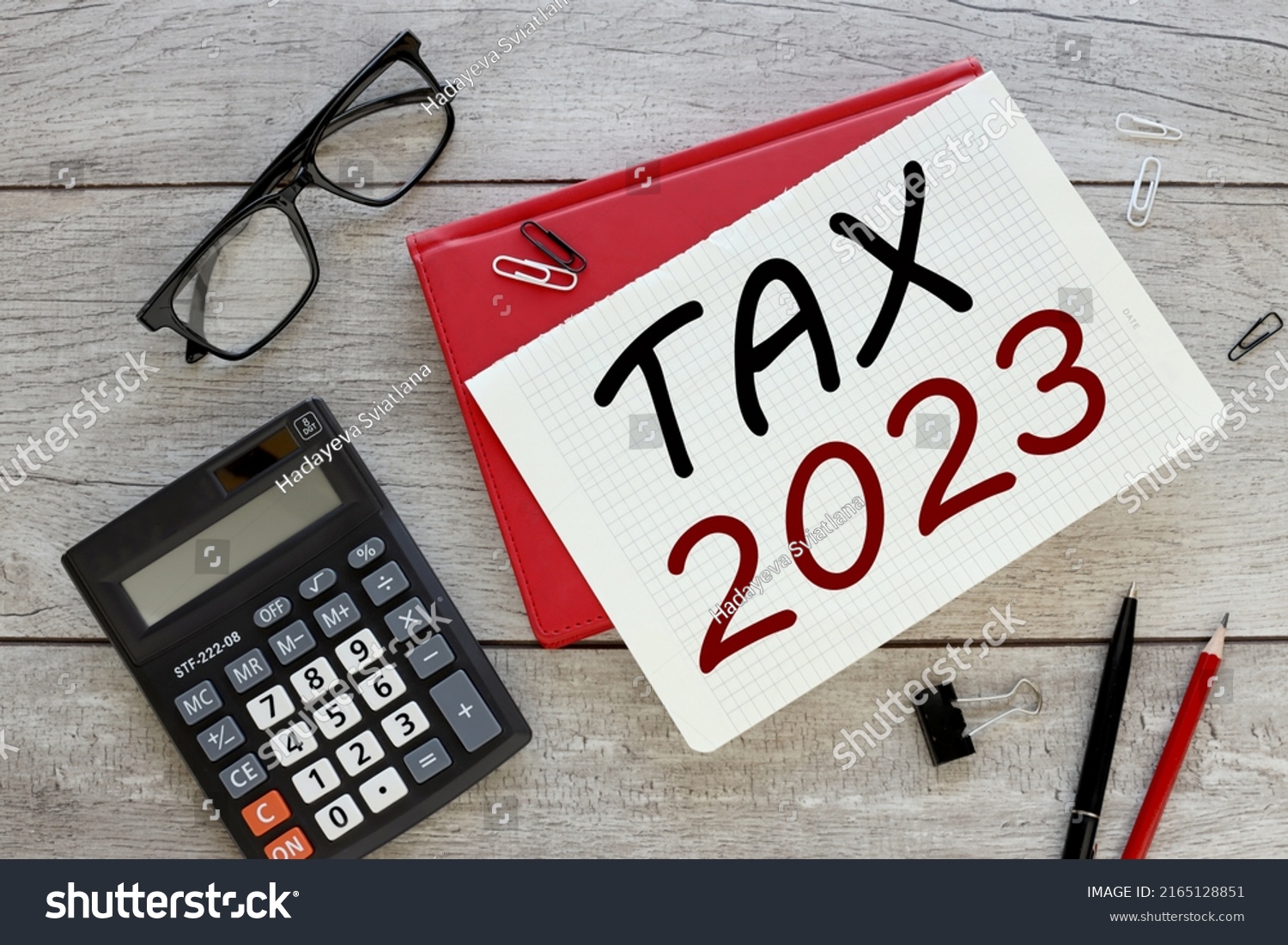 Taxes 2023 red notepad with text on the table #2165128851
